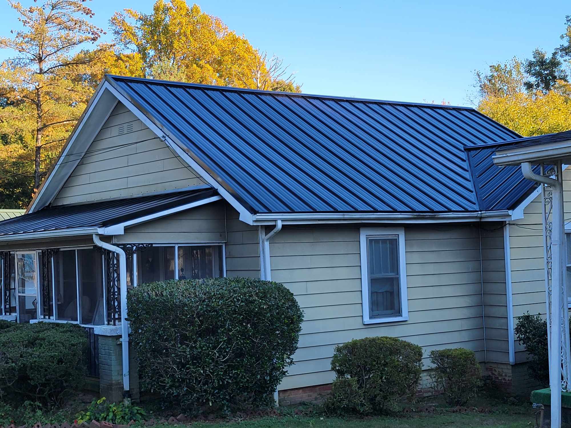 Metal Roofing Service in Durham including porch on a small house