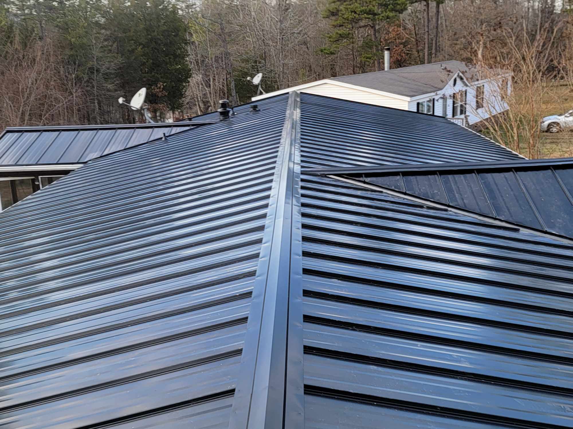 Metal Roof Service black roof installation